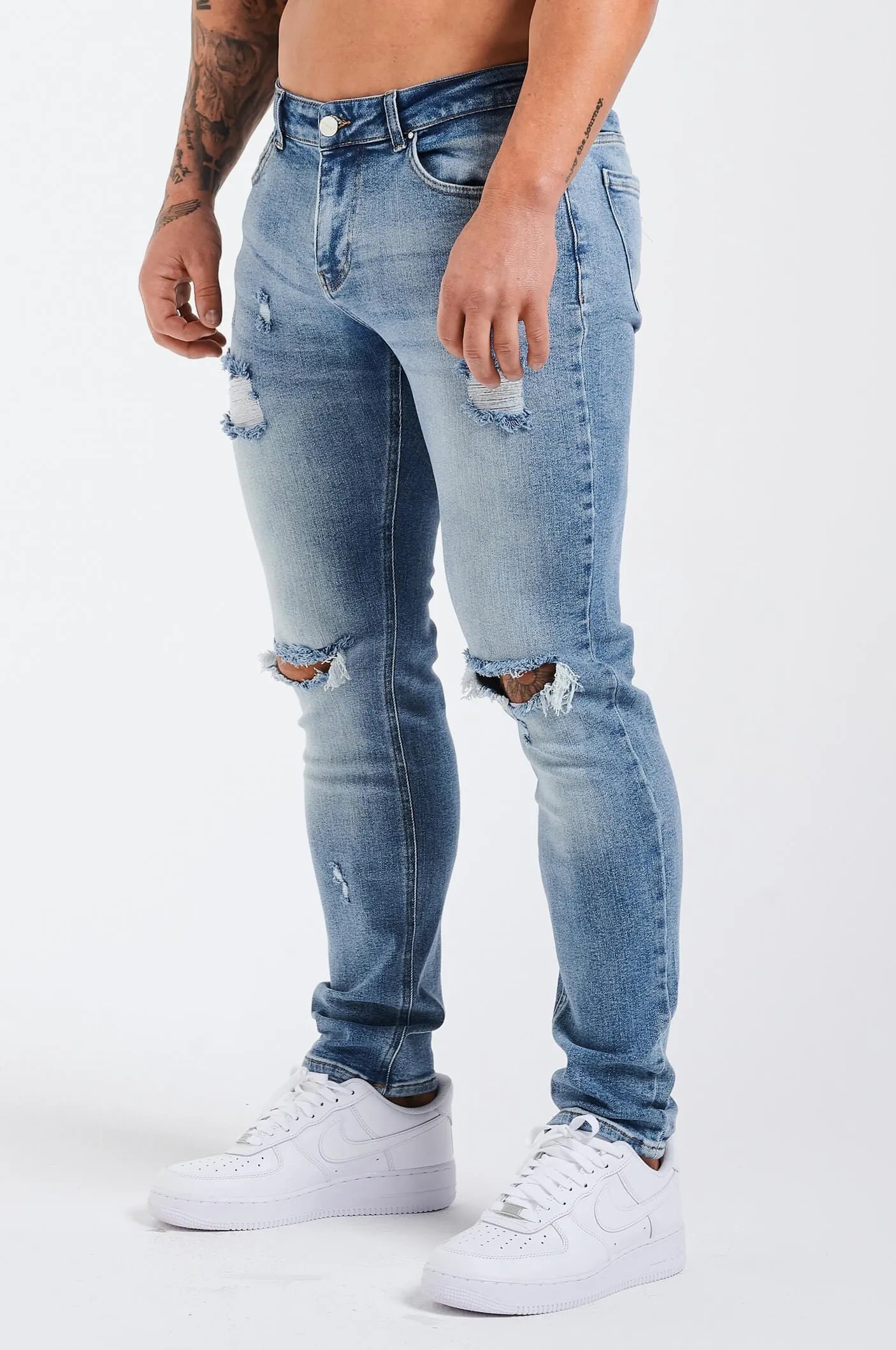 SLIM FIT JEANS 2.0 RIPPED AND REPAIRED - MID BLUE